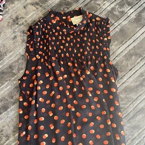 Sheer sleeveless blouse